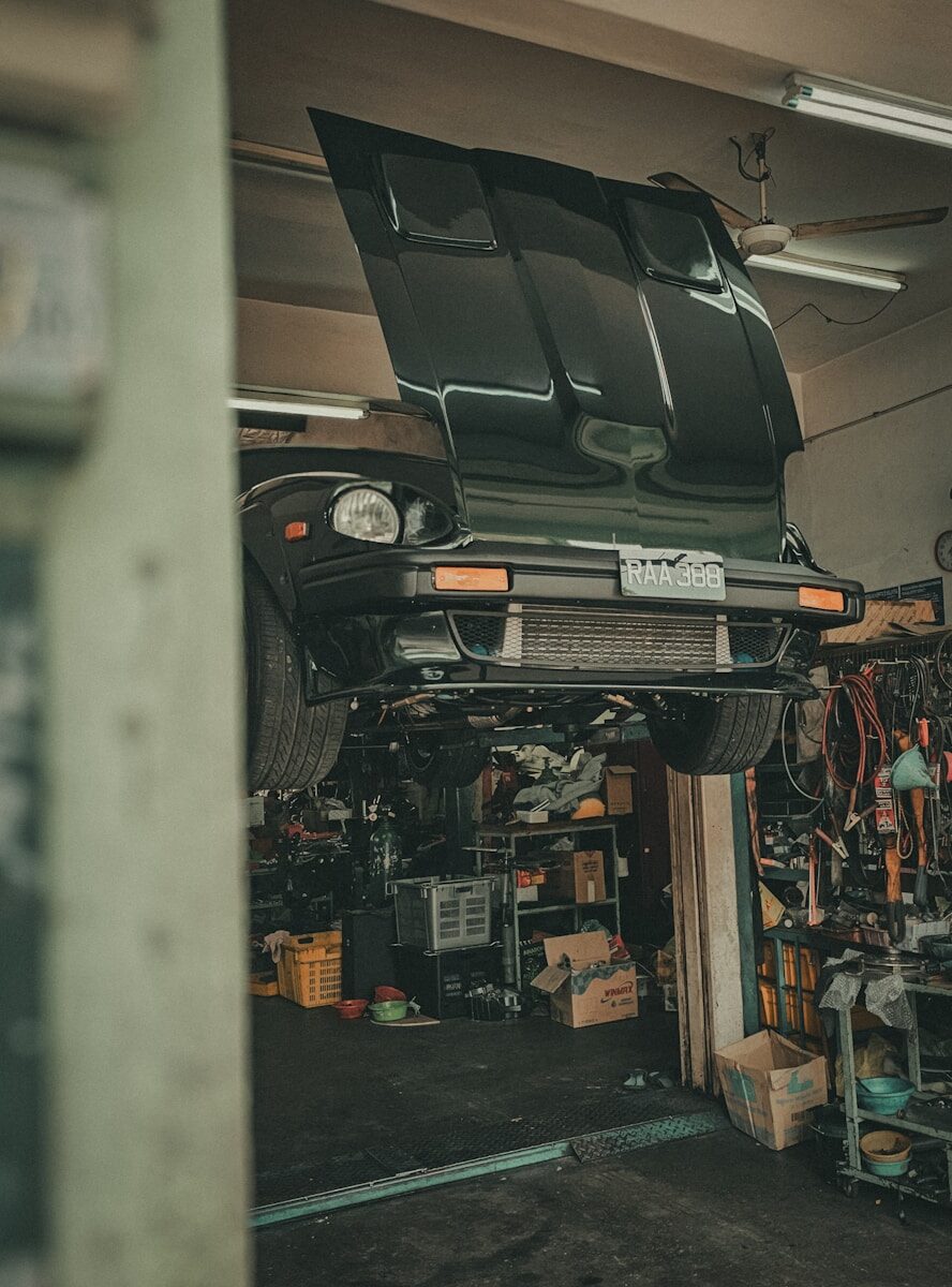 A car that is sitting on top of a lift